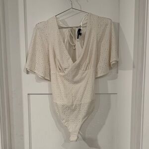 Elegant Cream Women's Bodysuit